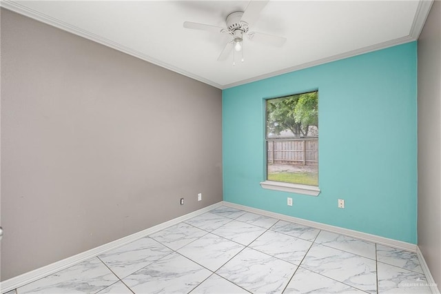 empty room featuring ceiling fan and ornamental molding