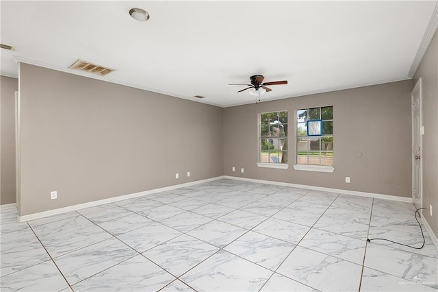 spare room with crown molding and ceiling fan