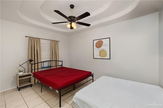 1609 Nassau St, Edinburg, TX 78541 - bedroom featuring a raised ceiling, light tile patterned flooring, and ceiling fan