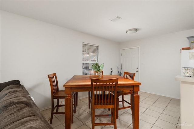 1609 Nassau St, Edinburg, TX 78541 - dining space featuring light tile patterned flooring and baseboards