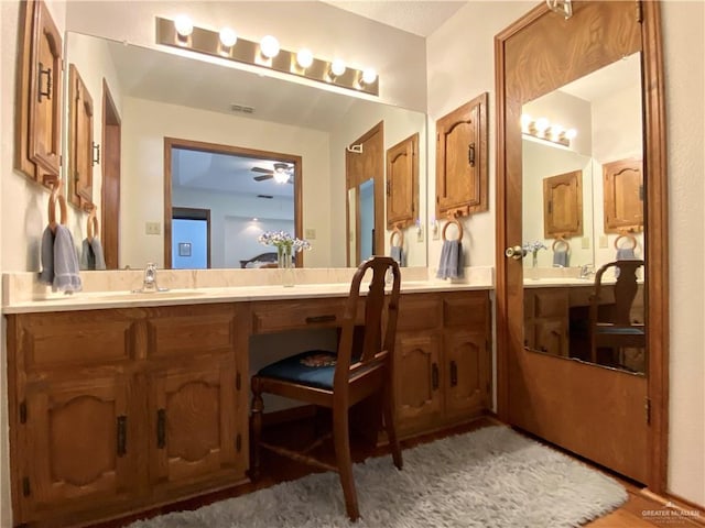 bathroom featuring vanity and ceiling fan