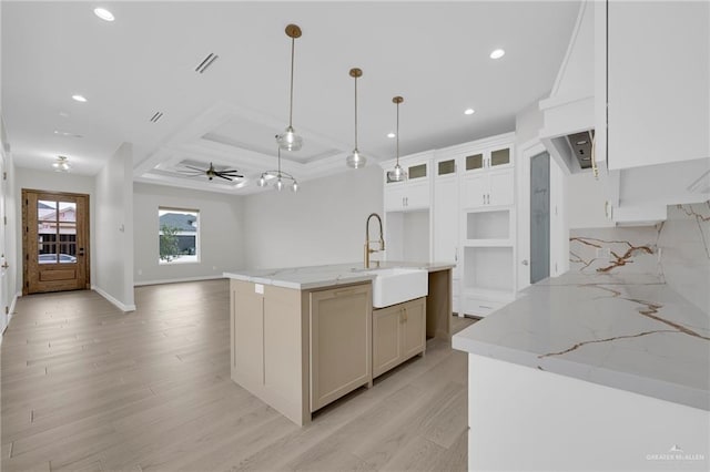 809 Azalea St, Mission, TX 78573 - kitchen featuring a sink, light wood-type flooring, recessed lighting, ceiling fan, and glass insert cabinets