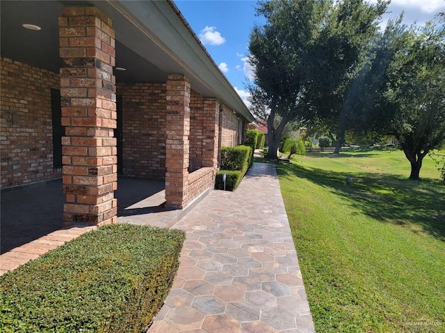 view of home's exterior featuring a yard