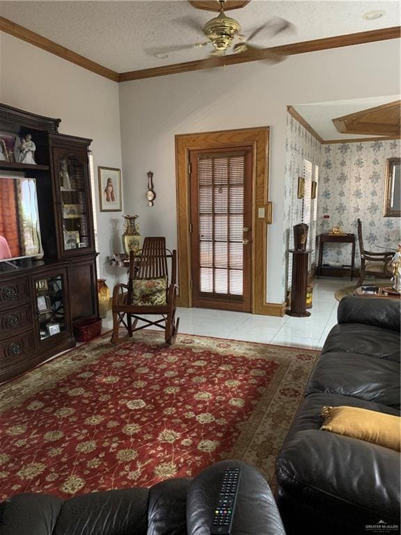 tiled living room featuring ceiling fan, crown molding, and a textured ceiling