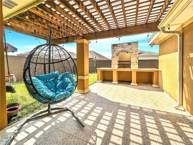 view of patio / terrace featuring a pergola and an outdoor stone fireplace