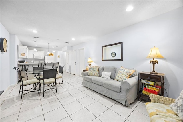 6300 Padre Blvd Unit 871, South Padre Island, TX 78597 - living area featuring light tile patterned floors and recessed lighting