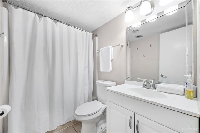 6300 Padre Blvd Unit 871, South Padre Island, TX 78597 - full bath featuring vanity, a textured ceiling, tile patterned floors, and curtained shower