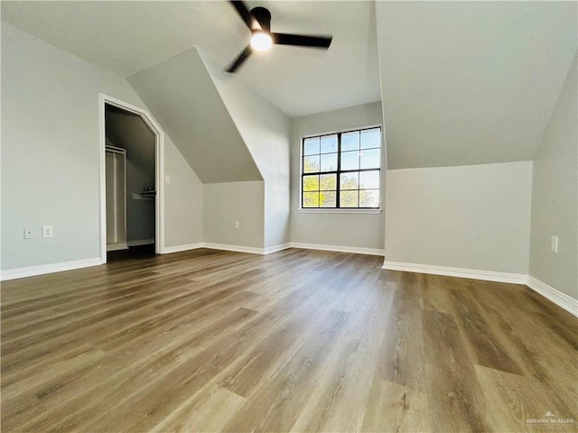 915 Durango St, Mission, TX 78572 - additional living space featuring baseboards, a ceiling fan, wood finished floors, and lofted ceiling