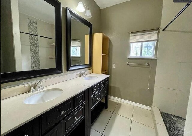 bathroom featuring tile patterned flooring and vanity