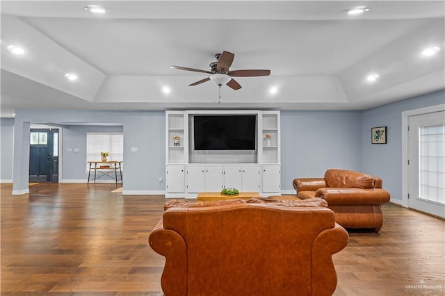 23807 Stuart Place Rd, Harlingen, TX 78552 - living room featuring a raised ceiling, wood finished floors, ceiling fan, and recessed lighting