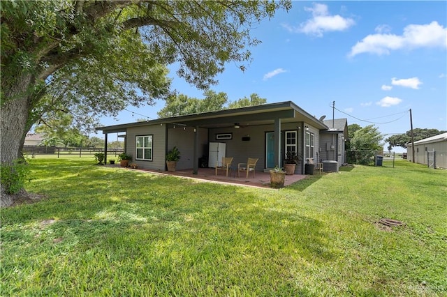23807 Stuart Place Rd, Harlingen, TX 78552 - rear view of house featuring a patio area and ceiling fan