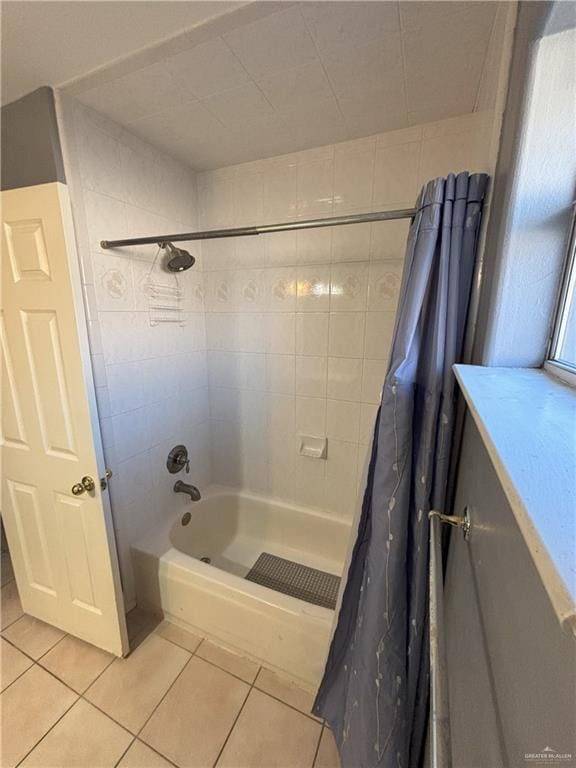 bathroom featuring tile patterned floors and shower / tub combo