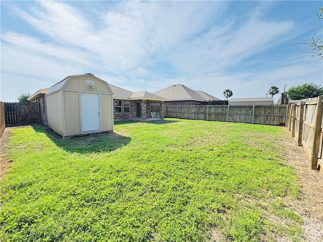 606 S Paseo Del Rey St, Mission, TX 78572 - view of yard featuring a storage unit and an outbuilding