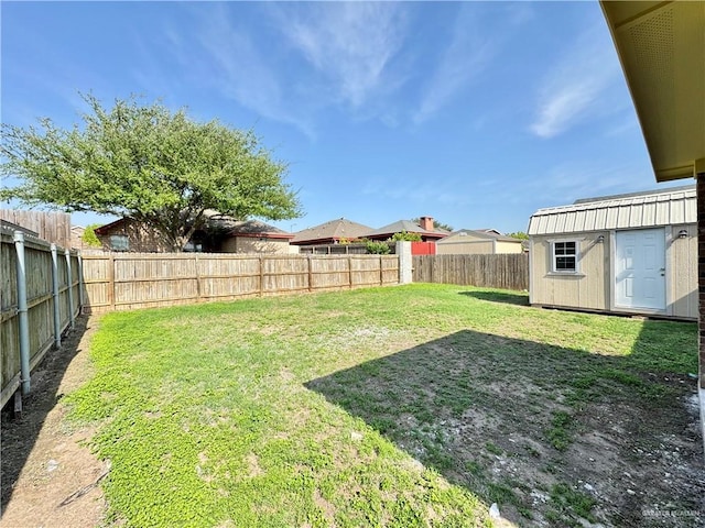 606 S Paseo Del Rey St, Mission, TX 78572 - view of yard with a storage shed and an outbuilding