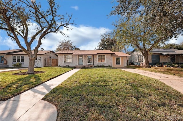 ranch-style house with a front yard