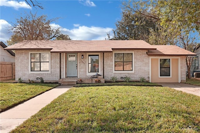 ranch-style home with a front yard