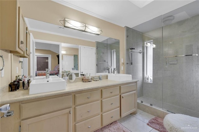 full bathroom with a stall shower, double vanity, tile patterned floors, and ornamental molding