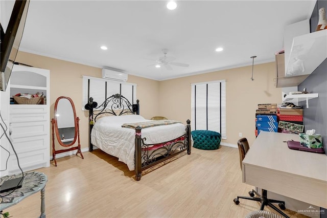 bedroom with a wall mounted AC, light wood-style floors, baseboards, crown molding, and recessed lighting