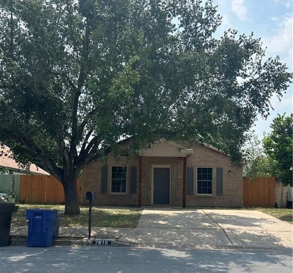 2816 N 40th St, Mcallen, TX 78501 - ranch-style house with concrete driveway and brick siding