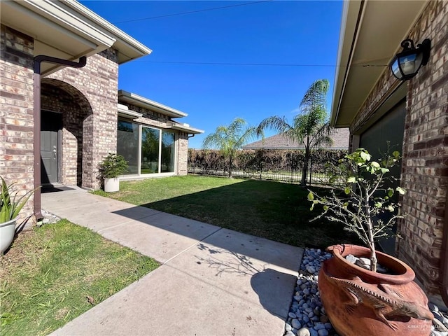 view of yard with fence