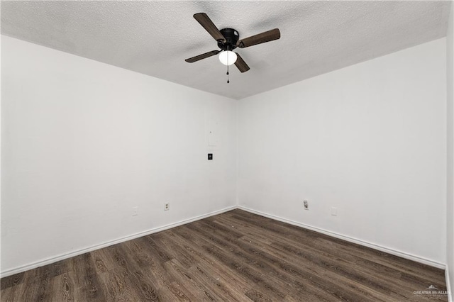 20538 Rio Rancho Rd, Harlingen, TX 78552 - spare room featuring dark wood-style flooring, a textured ceiling, and ceiling fan