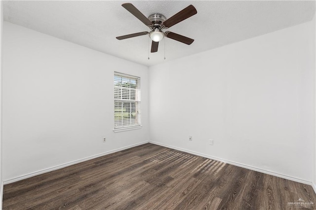 20538 Rio Rancho Rd, Harlingen, TX 78552 - unfurnished room featuring dark wood-style floors and ceiling fan