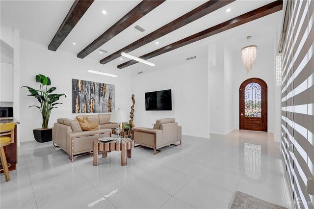 3408 Madison Ave, Edinburg, TX 78539 - living room featuring beam ceiling, light tile patterned floors, and recessed lighting