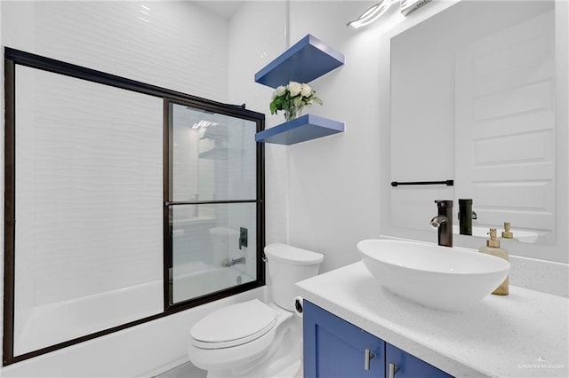 3408 Madison Ave, Edinburg, TX 78539 - full bathroom with vanity and bath / shower combo with glass door