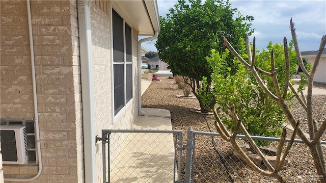 view of property exterior featuring cooling unit