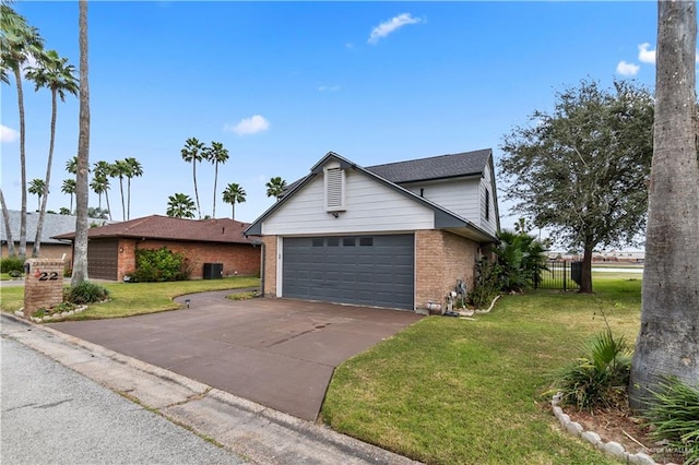 view of front of house featuring an attached garage, brick siding, fence, concrete driveway, and a front lawn