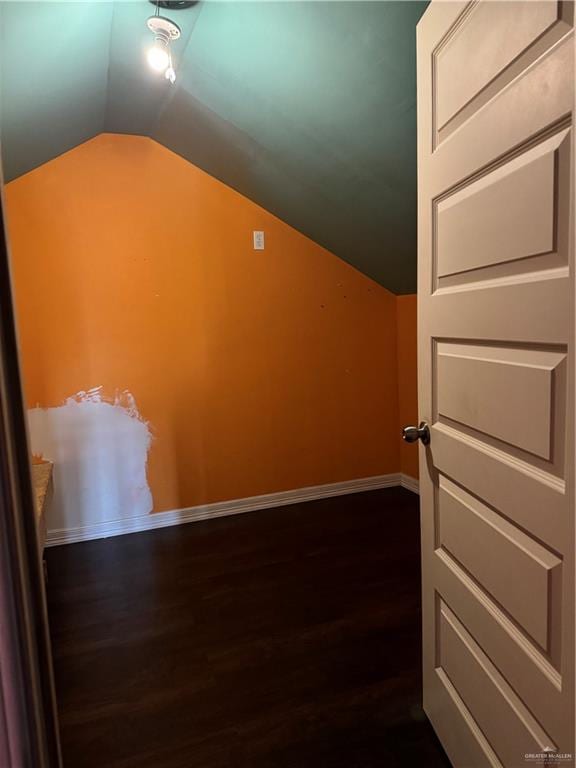4512 Devon St, Mercedes, TX 78570 - additional living space with dark wood-style flooring, baseboards, and lofted ceiling