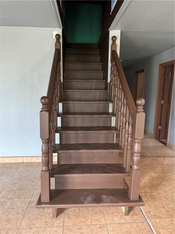 4512 Devon St, Mercedes, TX 78570 - stairs with tile patterned flooring and baseboards