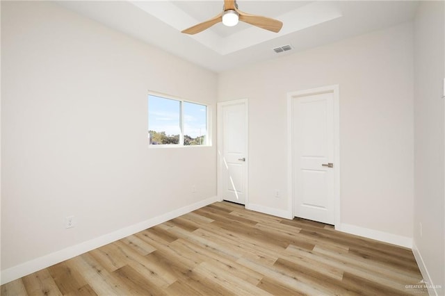 unfurnished bedroom featuring ceiling fan and light wood-type flooring