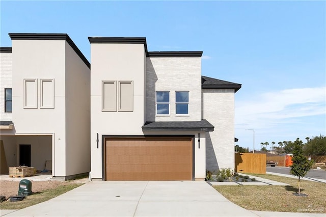 view of front of property featuring a garage