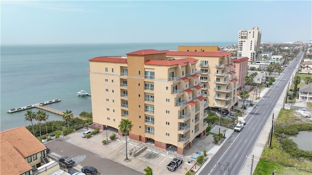 view of building exterior with a water view