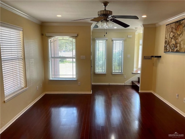 unfurnished room featuring ceiling fan, a healthy amount of sunlight, dark hardwood / wood-style flooring, and ornamental molding