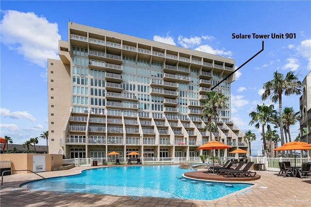 view of swimming pool with a patio area