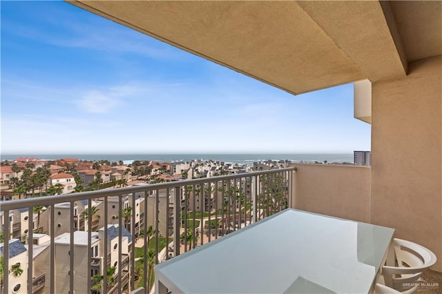 balcony featuring a water view