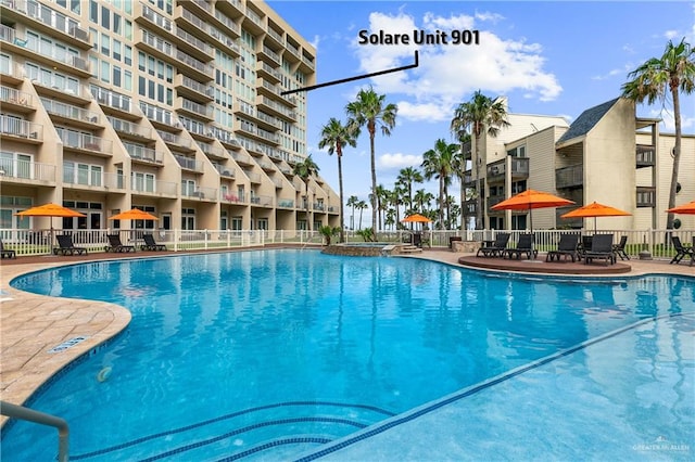 6300 Padre Blvd Unit 901, South Padre Island, TX 78597 - view of swimming pool with a patio area and a pool with connected hot tub