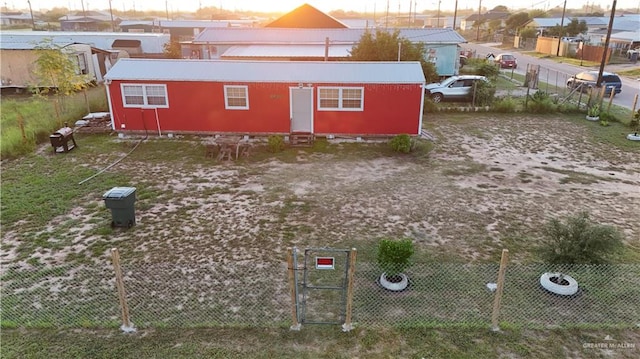 view of outdoor structure at dusk