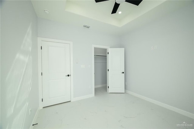 unfurnished bedroom featuring ceiling fan