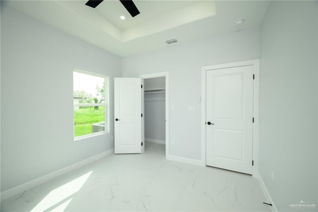 unfurnished bedroom with ceiling fan