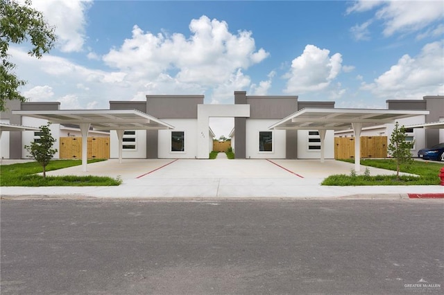 view of front facade featuring a carport