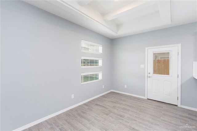 unfurnished room with light wood-type flooring