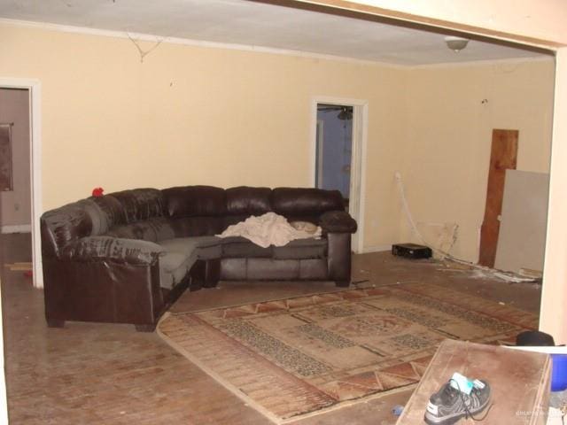 living room with ornamental molding