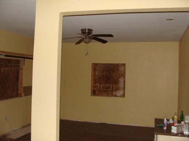 interior space featuring ceiling fan