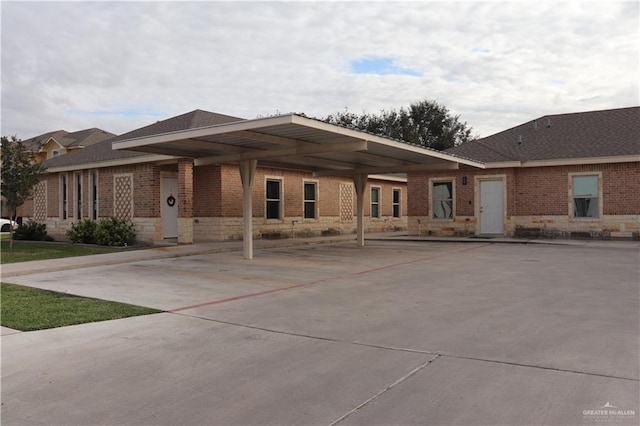 view of front of home with a carport