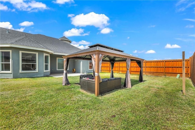 view of yard with a gazebo and outdoor lounge area