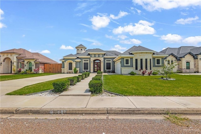 french country style house featuring a front yard