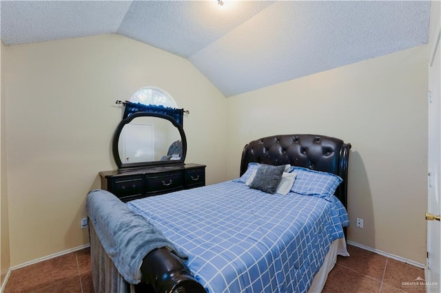 tiled bedroom with lofted ceiling and a textured ceiling